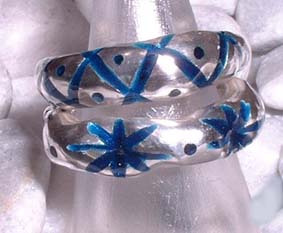rings with enamel crosses and stars