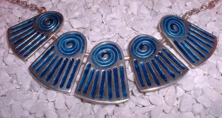 silver necklace with 5 blue enamel pieces
